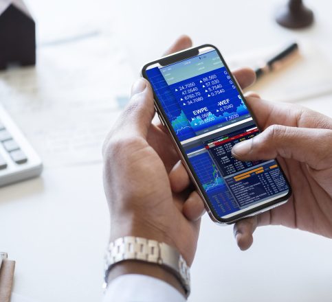 Businessman checking stock market online Businessman checking stock market online